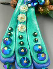 Clay peacock tail feathers with glass beads